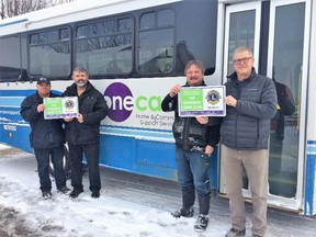 Goderich seniors are able to get groceries and take the worry out of winter driving with a free bus service on Tuesdays and Thursdays. This service is provided by the Goderich Lions Club and ONE CARE. Pictured here – ONE CARE driver Fred Nyland, Goderich Lions Club members, Dave McDonald, John Grace and Ron Kay. (Contributed photo)