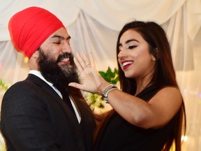 NDP Leader Jagmeet Singh proposes to Gurkiran Kaur at an engagement party in Toronto, Tuesday January 16, 2018. THE CANADIAN PRESS/Frank Gunn
