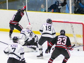 Greg Hay (No. 8 in black) celebrates after scoring a powerplay goal Thursday for the Sarnia Legionnaires. The tally helped his squad shade the Komoka Kings 5-4. (Submitted photo by Shawna Lavoie)