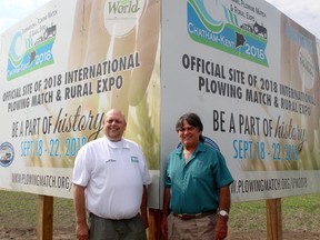 Leon Leclair, left, co-chair of the 2018 International Plowing Match & Rural Expo, and Jean Laprise, who is chairing the land committee and agricutural education committee, are pictured during the official sign unveiling held just outside of Pain Court, Ont. on Thursday June 15, 2017, where the event will take place in September 2018. (Ellwood Shreve/Postmedia Network)