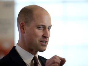 Britain's Prince William chats to guests at a reception after delivering a speech to celebrate the national rollout of the 'Step into Health' programme, at Chandos House in London, Thursday, Jan. 18, 2018. (AP Photo/Matt Dunham, Pool)