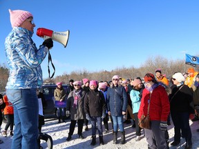 Vicki Jacobs, left, co-founder of Sudbury Women's Action Group, speaks to a crowd at Women's March Canada on Saturday. The march was held in solidarity with women and human rights groups from across the world. (John Lappa/Sudbury Star)