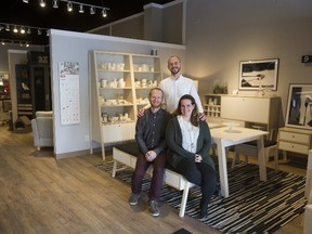 Brad and Claire Jack, both seated, have opened the Polish furniture store, Voelkel, with the help of the company?s export director Lukasz Szymanksi, rear. It?s the first outlet in Canada offering products from Meble Vox. (Derek Ruttan/The London Free Press)