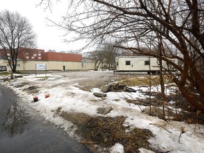 This Dundas Street lot could be home to a 41-unit affordable housing project, inset, if the faith-based London Affordable Housing Foundation has its way. (MORRIS LAMONT, The London Free Press)