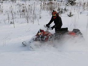 Ontario Provincial Police and Ontario Federation of Snowmobile Clubs have launched Safe Snowmobile Week (Jan. 20 – 28, 2018). (Postmedia File Photo)