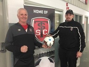 Head coach Phil Trueman, left, and president Rob Cameron of the St. Thomas Soccer Club announce a partnership with London TFC Academy. The partnership will allow athletes from St. Thomas to move forward with their soccer careers to a level not currently achievable in the city. (Laura Broadley/Times-Journal)