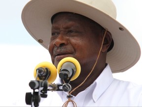 This file photo taken on Nov. 11, 2017 shows Uganda's President Yoweri Museveni delivering a speech during the ceremony marking the laying of the foundation stone for the starting point of the East Africa Crude Oil Pipeline in Kabaale. Gael Grilhot / AFP / Getty Images