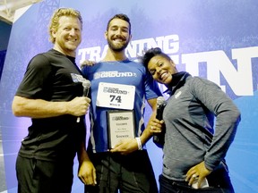 Laurentian University student-athlete Charles Alexander is flanked by former Olympians Curt Harnett and Karina LeBlanc following an RBC Traiining Ground regional final in Toronto. Alexander, a 20-year-old outdoor adventure leadership student and standout for the Voyageurs rowing team, received funding from RBC to pursue his Olympic aspirations. Photo supplied