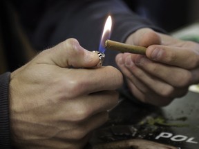 Ontario is considering allowing licensed cannabis consumption lounges in the province once recreational marijuana is legalized, and is asking the public to weigh in on the idea.
(JOE MAHONEY/THE CANADIAN PRESS)