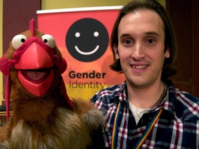 Andrew Rosser, president of Pride London Festival, holds a puppet featured in a series of educational videos recently produced in London. (CHRIS MONTANINI, Londoner)