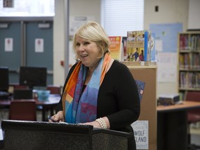 London North Centre MPP Deb Matthews takes to the podium Wednesday at London?s Masonville elementary school to announce funding for three new area schools and improvements to four others. Matthews is not seeking re-election in this year?s provincial election, which must be held by June 7. (DEREK RUTTAN, The London Free Press)