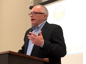 Barry Senft, CEO of Grain Farmers of Ontario, talks to members at a district meeting near Aylmer on Jan. 17. The organization has been marketing to people outside their usual circles to change public opinions on grain products and GMOs – people like young mothers and millennials. Louis Pin/Postmedia Network