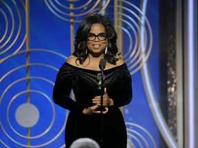 Oprah Winfrey accepts the Cecil B. DeMille Award at the 75th Annual Golden Globe Awards in Beverly Hills, Calif., on Sunday, Jan. 7, 2018. (Paul Drinkwater/NBC via AP)