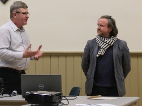 BRUCE BELL/THE INTELLIGENCER 
County Food Hub steering committee co-chairmen Todd Foster (left) and Mike Farrell present plans for a commercial kitchen project at Sophiasburgh Central School to a group of residents at Demorestville Town Hall on Wednesday evening.