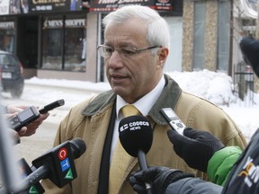Nipissing MPP Vic Fedeli speaks to reporters Thursday in North Bay.