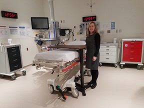 Karen Davies, vice president and chief nursing executive, shows off one of two trauma bays in the new emergency department at St. Thomas Elgin General Hospital. The department, which opened Thursday morning, is on the first level of the $98 million expansion of the hospital. (Laura Broadley/Times-Journal)