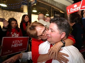 Liberal MP Kent Hehr surrounded by supporters at his headquarters at the Bank and Baron Pub in Calgary on Monday October 19, 2015 after winning his riding. Darren Makowichuk/Calgary Sun/Postmedia Network