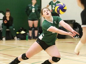 Caroline Pellerin of the Collge BorŽal Vipres gets set to bump the ball during OCAA women's volleyball action against Cambrian College in Sudbury, Ont. on Wednesday January 24, 2018. Gino Donato/Sudbury Star/Postmedia Network