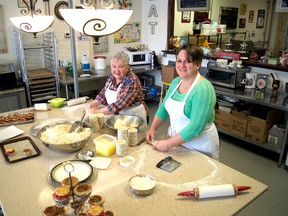 For regulars of Fancy Tarts on Springbank Drive, smiles from mom/daughter duo Shirley Lassaline (left) and Sara Saldana are a familiar sight as they bake batches of tasty treats. Missing here is daughter and sister Melissa Lassaline, but Fancy Tarts will be well represented at the Lifestyle Home Show at the Western Fair this weekend. (CHRIS MONTANINI, Londoner)