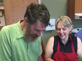 Bill, a member with Opening Doors in Sarnia, and Rosemary, a volunteer, participate in the cooking and nutrition programs, just a couple of many programs operated by Opening Doors helping to fight isolation and depression while promoting healthy lifestyle choices. Based on the success of this program, The North Lambton Community Health Centre just received $30,000 from the United Way of Sarnia-Lambton to expand the program into the Lambton Shores area. (Handout/The Observer)