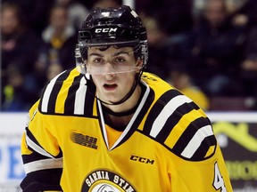 Sarnia Sting defenceman Cam Dineen plays against the Soo Greyhounds at Progressive Auto Sales Arena in Sarnia, Ont., on Friday, Jan. 19, 2018. (MARK MALONE/Postmedia Network)