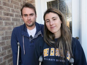 Windsor residents Eddie Zytner and his girlfriend Katie Stephens need crutches after both contracted the parasitic condition called cutaneous larva migrans – hookworms – on a vacation in the Dominican Republic in January 2018. (NICK BRANCACCIO/Windsor Star)