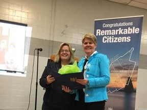 On the right, Wendy Hutton hailing from Seaforth accepts the Remarkable Citizens Award from Huron-Bruce MPP Lisa Thompson Jan. 25 at the Teeswater Community Complex. (Courtesy of Facebook)