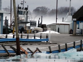 The north side of the causeway road leading to the Bluewater Ferry at Sombra, Ontario was damaged by ice on Thursday, Jan. 11, causing the ferry service to be closed indefinitely. (David Gough/Postmedia Network)