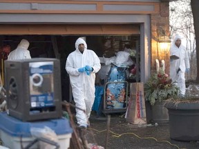 The Toronto Police Forensic Unit search a home at 53 Mallory Crescent related to the arrest of 66-year-old landscaper Bruce McArthur suspected of first-degree murder in the cases of two men who went missing from the Church and Wellesley area. (Stan Behal/Postmedia Network)