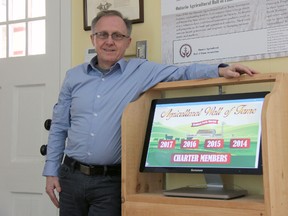John Kastner, general manager of the Stratford Perth Museum, stands next to a screen where people can see the museum's virtual wall of fame. The museum has now opened the nomination period for potential 2018 inductees. (JONATHAN JUHA/THE BEACON HERALD/POSTMEDIA NETWORK)