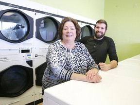 Done for you Laundry owner Alain Blais with manager Ruth Hembruff on Monday. The new laundromat specializes in Wash and Fold a service that allows customers to drop off laundry then pick it up washed and folded. (Gino Donato/Sudbury Star)