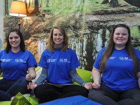 Brianne Thibert, co-ordinator of Cambrian’s First Generation Program, Alison De Luisa, associate vice-president of Student and Employee Development at Cambrian, and Alanna LaHay, president of Cambrian Athletic Association, relax in Cambrian’s Zen Den. Supplied photo