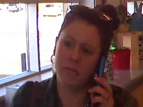 Police are turning to the public for help in identifying the suspect, pictured, in a liquor store theft. (Kingston Police/Supplied photo)