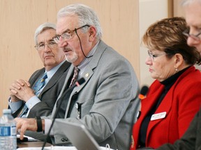 Luke Hendry/The Intelligencer
Newly-elected Quinte Health Care vice-chairman David MacKinnon, left, and chairman Stuart Wright take part in a board meeting Tuesday in Belleville. With them are president and chief executive officer Mary Clare Egberts and chief of staff Dr. Dick Zoutman.
