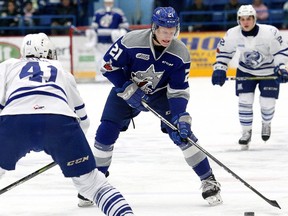 Nolan Hutcheson of the Sudbury Wolves (21) carries the puck during OHL action at Sudbury Community Arena in Sudbury, Ont. on Friday, January 12, 2018. John Lappa/Sudbury Star/Postmedia Network