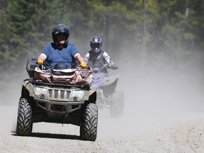 Off roaders hit the trails on their ATVs at McLean Creek, a popular camping and offroad use area west of Calgary on Sunday May 21, 2017. (Jim Wells//Postmedia Network)