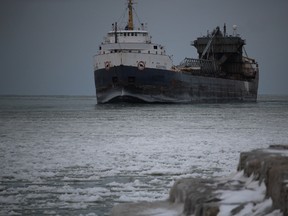 A freighter enters the St. Clair River after coming through Lake Huron. Environment Canada had predicted gale-force north  winds  on the lake for Wednesday. (NEIL BOWEN/Sarnia Observer)