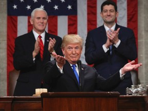 President Donald Trump gestures as delivers his first State of the Union address in the House chamber of the U.S. Capitol to a joint session of Congress. (AP)
