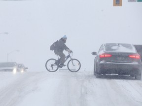 It was a slow commute for motorists and pedestrians with Wednesday's snowfall. Police issued a release the same day urging travellers by vehicle and foot to be more vigilant after 300 collisions were reported in January, including five that involved pedestrians. (Gino Donato/Sudbury Star)