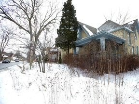 The city says Nan Finlayson?s home at 100 Stanley St. has to go so the rail bridge over Wharncliffe Road South can be repaired and the road widened. (Derek Ruttan/The London Free Press)