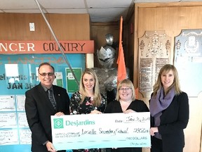 Jean-Marc Spencer, left, executive director of Voyageurs Credit Union, Sophie Gingras, communications and public affairs agent at Voyageurs Credit Union, Heather Boychuk, program leader of mathematics at Lasalle Secondary School, and Maureen McNamara, principal of Lasalle Secondary School, were on hand for a cheque presentation at Lasalle. Supplied photo