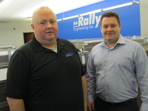 Paul Croft, left, and Mike Thompson, managers with Rally Engineering, stand in its new office space on London Road. The Sarnia office of the Edmonton-based firm has been open for one year, and is looking to double the size of its staff in the coming year. (Paul Morden/Sarnia Observer/Postmedia Network)
