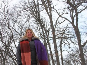 Patti Ross, manager of parks, forestry and horticulture with the City of Sarnia, stands amid oak trees in Canatara Park. City officials are preparing to combat oak wilt, as it threatens from Michigan. (Tyler Kula/Sarnia Observer)