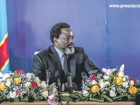 Democratic Republic of Congo President Joseph Kabila, holds a press conference for the first time in five years on Jan. 26. He stood by the timetable for delayed elections despite demands that he step down ahead of the poll. (THOMAS NICOLON/AFP/Getty Images)