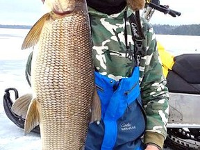 Local angler Matthew Eles shows off a nice whitefish taken on a local lake. The young angler notes paying attention to the sonar and downsizing as the keys to catching whitefish. Photo supplied