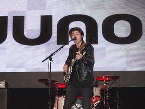 Ivory Hours? front man Luke Rose plays with the band at the London Music Club during a press conference on Monday to announce that London will host the 2019 Juno Awards. (DEREK RUTTAN, The London Free Press)