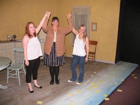 Jack Evans/For The Intelligencer
Kodie Trahan–Guay, Kayla Alexandropoulos and Kelsey Collins do a curtain call amidst the notes from their deceased mother at the end of “Marion Bridge.” The play continues at The Pinnacle Playhouse through to Feb. 17.