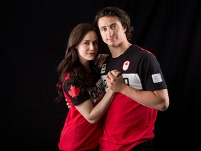 Olympic gold medallists Tessa Virtue, left, and Scott Moir pose for photos during the Canadian team Olympic Summit in Calgary, on Saturday June 3, 2017. Leah Hennel/Postmedia