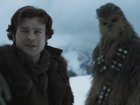 Alden Ehrenreich and Joonas Suotamo in a scene from Solo: A Star Wars Story. (Screenshot)