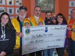 Bryanna Orsino, left, of Big Brothers Big Sisters, Lion Keith Argent, Lion president Gilles Lafrance,  Big Brother Rob Patterson, Chantal Gladu, executive director of Big Brothers Big Sisters, and Lion Blaine Lachance participate in a cheque presentation. Supplied photo